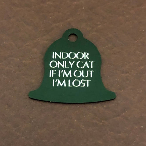 Small green bell tag that says: Indoor only cat If I'm out I'm lost. All engraved in capital letters.